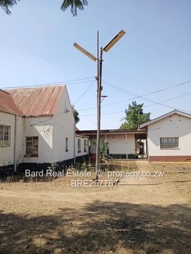 Main-Road Retail Site with Existing Building — 4,000 m²