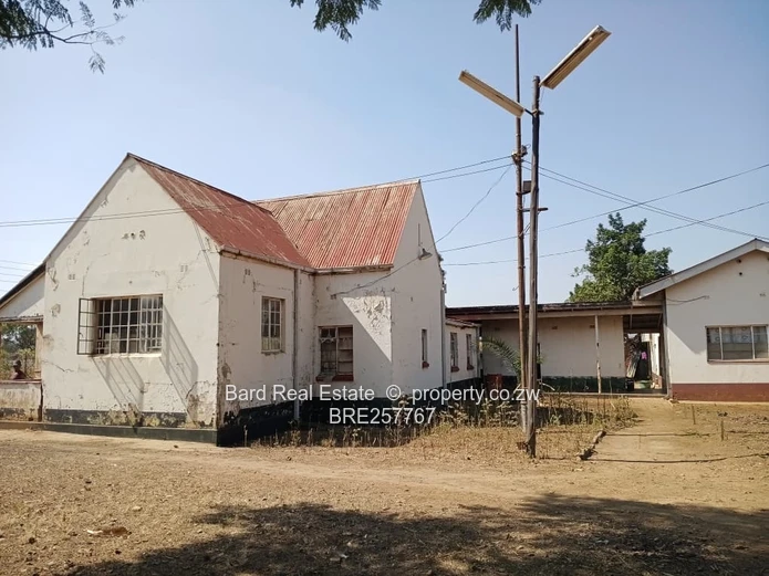 Main-Road Retail Site with Existing Building — 4,000 m²