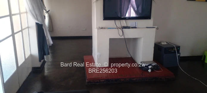 Mainway Meadows: 4-Bed, 3-Bath Home with Fireplace & Garage